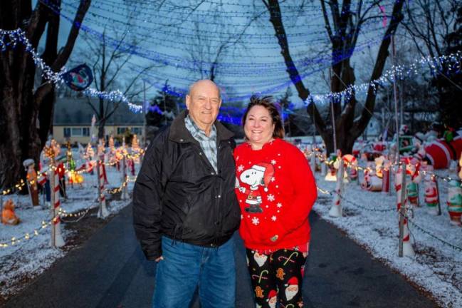 Vincent with his daughter, Paula Poloniak Kammarada. Her request for Christmas decorations 50 years ago kicked off the epic, decades-long display at Spanktown Road. Photo: Sammie Finch.