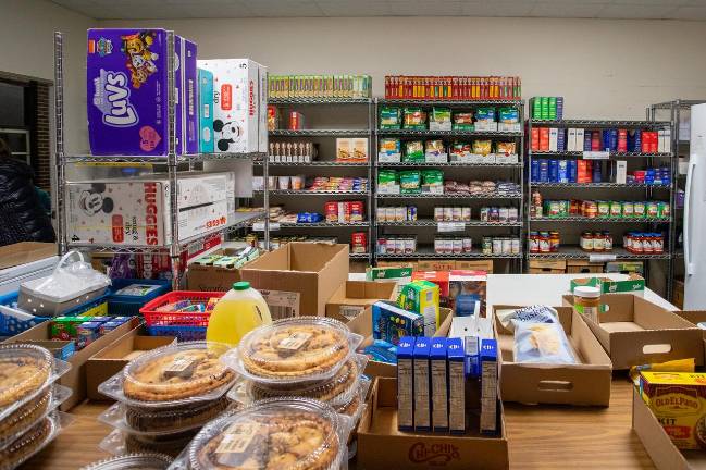 Inside the Warwick Ecumenical Food Pantry where limited supplies of canned goods and shelf-stable items are stored for those relying on their support while SNAP benefits are frozen. Photo: Aja Brandt