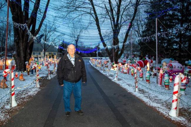Poloniak with his 2022 Christmas lights. He aimed to make this year’s display the best yet. Photo: Sammie Finch.