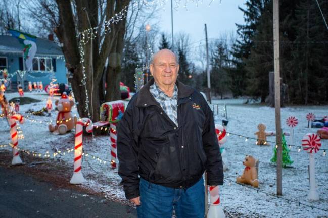 It takes five weeks -- and lots of helping hands -- for Warwick resident Vincent Poloniak to get the holiday light display set up outside his home each year. Photo: Sammie Finch.