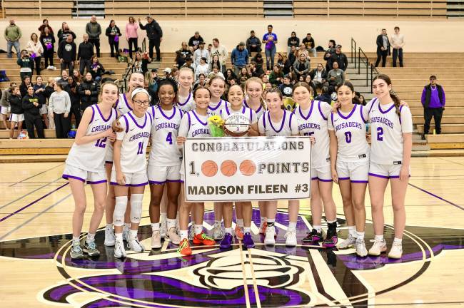 Madison Fileen became the first female Crusader to score 1,000 points in her varsity basketball career.
