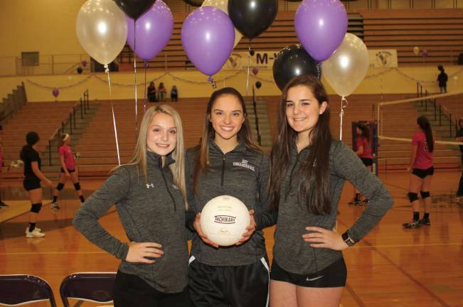 Photos by William DimmitCrusader seniors Hayley Cowart, Amanda Kelly and Jessica Ader.