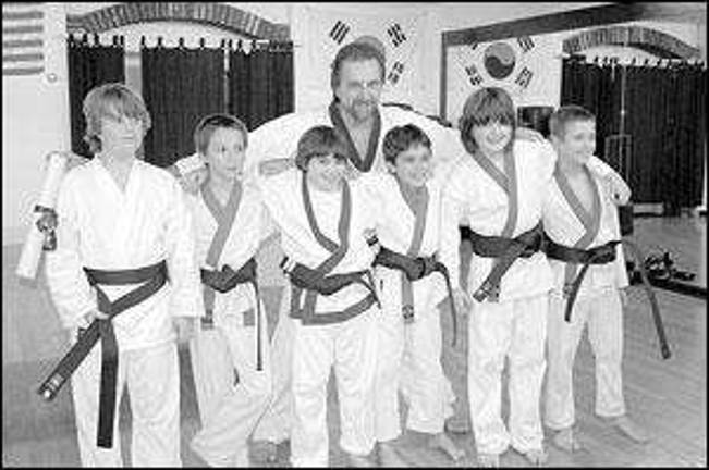 Seven Stars awards black belts:
