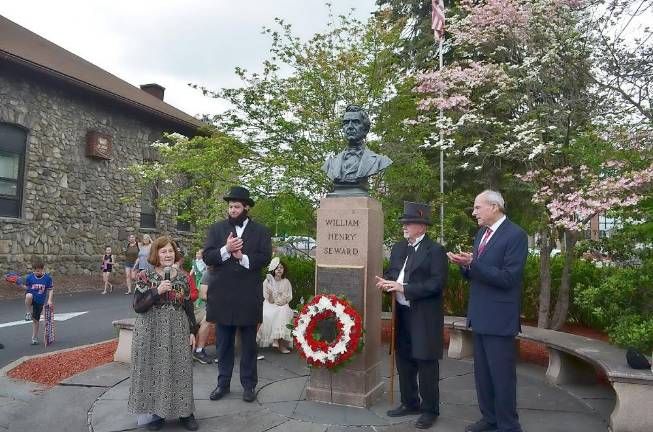 Joan Kissinger, President of the Florida Historical Society, (from left) spoke during a wreath ceremony, with Mayor Daniel Harter dressed as President Abraham Lincoln, Deputy Mayor Thomas Fuller as William Henry Seward, and Town Justice Peter Barlet.