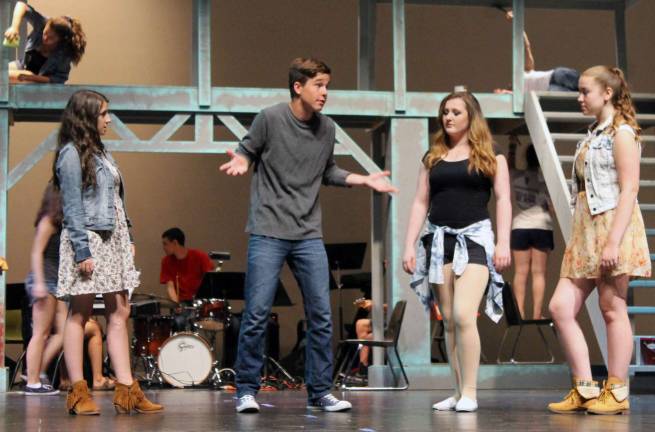 9148 - Lead character Ren McCormack (Cody VerValin) gets a lesson on the town of Bomont from (l.-r.) Rusty (Hannah Jones), Wendy Jo (Kellie Baer), and Urleen (Pattie Allen).