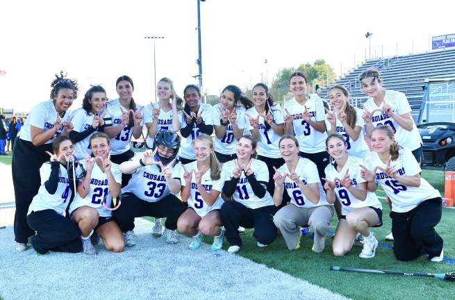 Crusaders celebrate their victory over the Middies.