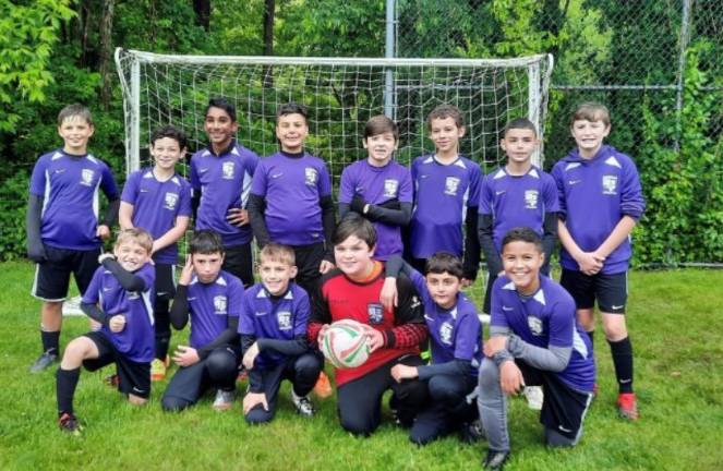 Members of the MWUSC U11 Renegades are, beginning in the back row: George Enslen, Spencer Gordon, Nick Thomas, Vincent Fini, Xavier Cangialosi, Elijah Robertson, Sean Loughlin and Ryan Cunningham; and in front: Brady Magazino, Ryan Havercamp, Owen Rostowski, Justin Landusky, Mario Levato and Gian Acosta. Not pictured are: Mohammed Yusuf, Coach Brendan Mullan and Coach Vinny Fini. Provided photos.