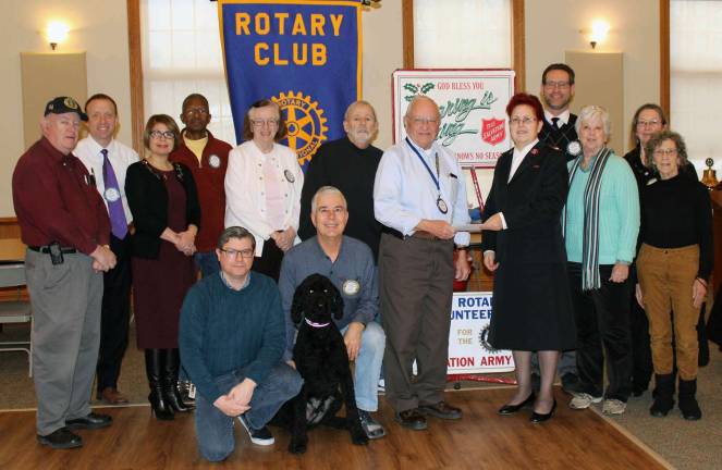 M W Rotary Club and M W Interact students ring the bell for charity