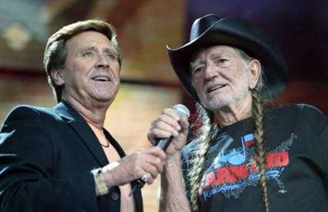 Willie Nelson, right, sings with Jimmy Sturr at the Farm Aid Concert in Camden, N.J., in 2006. (AP Photo/Tim Larsen). They have just released their fifth CD together, entitled &quot;Forget Me Never.&quot;