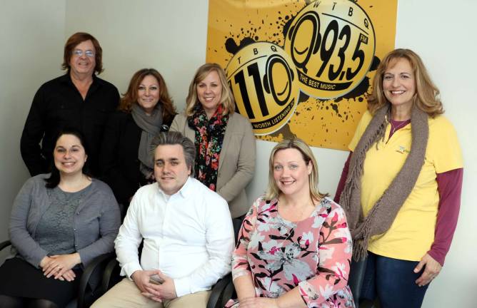Photo by Roger Gavan Front, from left, are: Stephanie Molinelli of Safe Homes, Chris Molinelli and Liz Schmidt of HONOR; and rear, from left, are: Frank Truatt, owner of WTBQ, Casey Macdonald of Hudson Valley Cancer, Biz Rowley of Community Foundation and Deb Major of Zylofone.