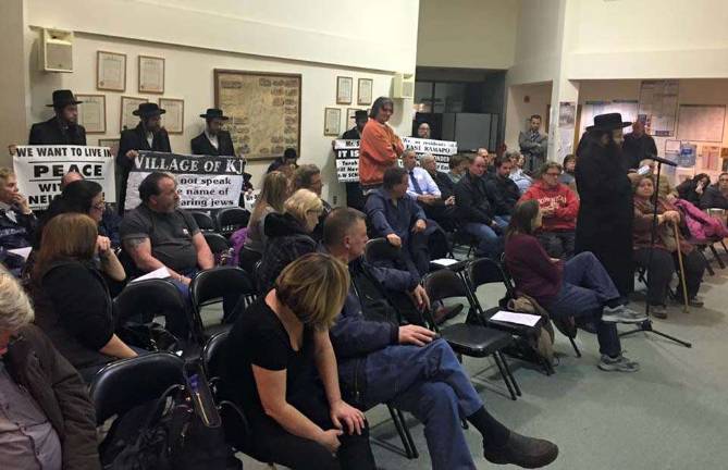 Photo by Matthew DeRosa Rabbi Joel Loeb of the Monroe Committee for Peace and Harmony addressed the audience at the South Blooming Grove Village meeting earler this week. &#xfe;&#xc4;&#xfa;We hate that this block busting is happening,&#xfe;&#xc4;&#xf9; he said. &#xfe;&#xc4;&#xfa;Many people in Kiryas Joel want to find a new home because of discontent, because their leaders do not follow the Torah to live in peace and harmony.&#xfe;&#xc4;&#xf9;