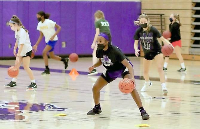 Layla Green leads the team through drills.