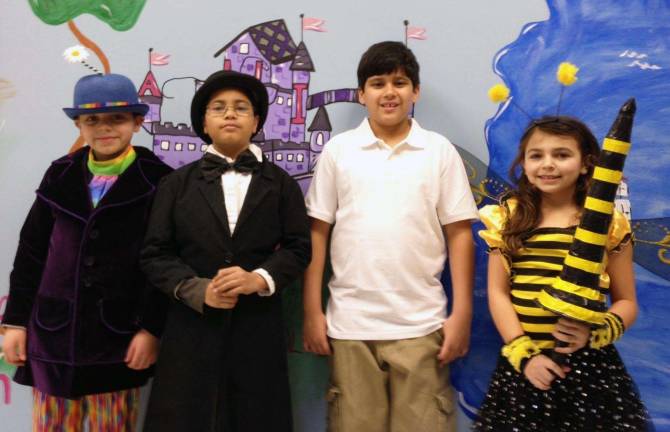 Eric Perricelli, left, as the &quot;Whether Man,&quot; Justin Garay-Ramos as the &quot;Humbug,&quot; Justin Polanco as Milo and Lindsay Tabakman as the &quot;Spelling Bee.&quot;