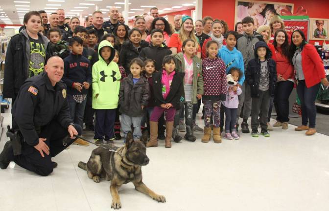 A group shot of members of the Woodbury PBA and the children who attended the annual &#x201c;Shop with a Cop&#x201d; shopping spree at Target earlier this week.