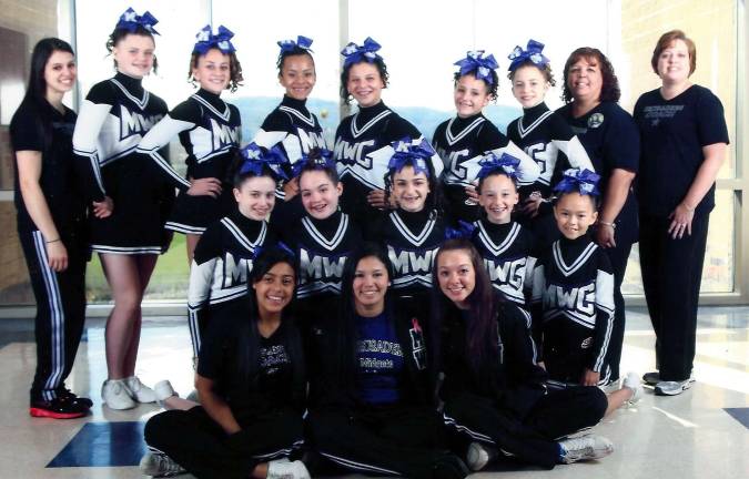 The Junior Midgets, in the back row from the left: Coach Caila Friedman, Kaitlyn Regan, Georgia Brink, Angelina Acosta, Lauren Friedman, Antonia Esposito, Mary Banville, Coach Lee Friedman and Coach Laurie Campbell. Middle row: Madison Smith, Riley Sikoryak, Nicole Rawiszer, Emily Campbell and Isabel Sterett. Front row: Trainers Kirstie Alvarez, Christina Torres and Lauren LaBella.