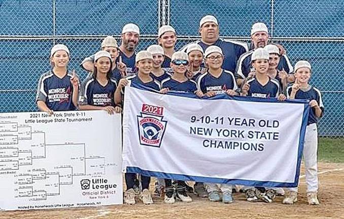 Members of the Monroe-Woodbury Little League 11U team: Back Row- Manager Rich Monda, “Big” Mike Zymberi, Coach John Bauer and Coach Matt Bond; second row: Joey Bauer, Brian Sorce, Evan Mejia and Connor McHale; and in front: Cole Engel, Mikey Monda, Brandon Schwarz, Aaron Drucker, Kyle Lascano, Drew Lugo and Jake Bond. All Photo Credit to Michelle McHale.