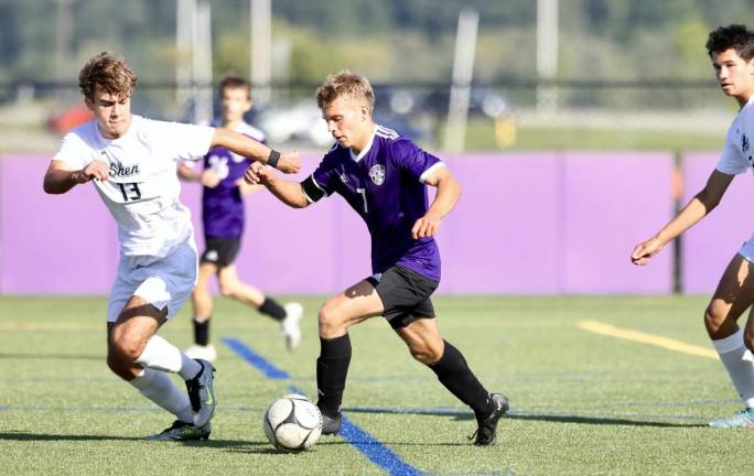 Ryan Mattison (#7) on the attack in the first half against Shenendehowa.