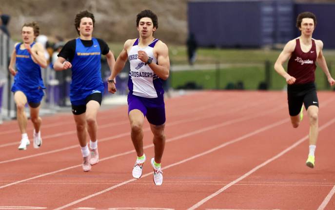 Nicholas Almeida took first in the 400 meter dash with a time of 52.08. Photos by William Dimmit.