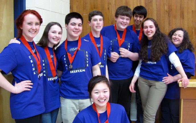 The Division III, Problem 3 team, from the left: Sylwia Seimion, Nancy Rutishauser, Nuo Min Huang, Jordan Glass, Matthew Taguer, Saharsh Hajela, Coach Jess Mazzola and Coach Jo Ann Mazzola.
