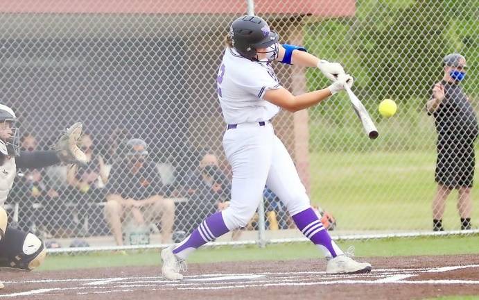 Arianna Exarchakis drives the ball to left in the fifth inning.