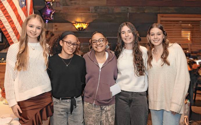 Crusader senior girls Kayla Postolowski, Chloe Ahorrio, Madison Fileen, Brenna Quinn, and Sienna Feeley.