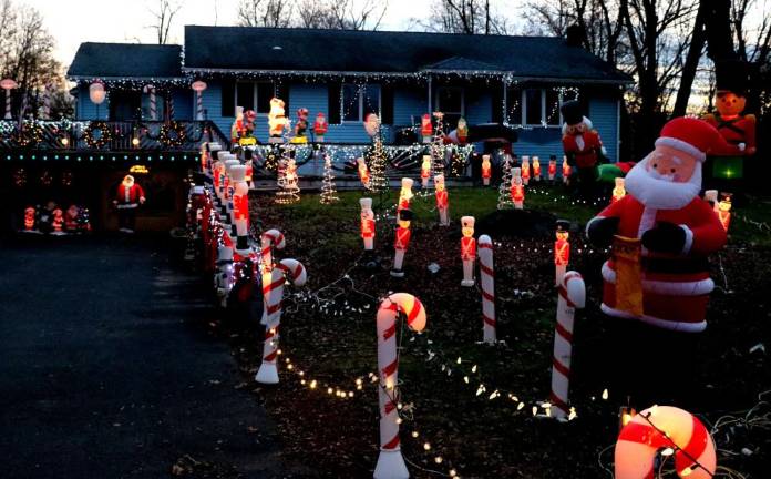 It takes Vincent Poloniak and a few friends about three weeks to complete the annual holiday project.