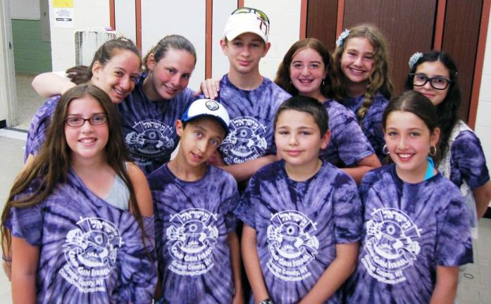 Wearing their camp T-shirts, the Pioneer division, called &igrave;Geulah Guitars&icirc; record Mattisyahu&iacute;s &igrave;One Day.&quot;