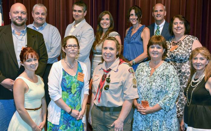 Photos provided Gathering are some of the O&amp;R STEM grant recipients, in the back row, from the left: Tom Christopher, left, of Orange-Ulster BOCES Career and Technical Education Center in Goshen; Menno Poutsma of Woodbury Boy Scout Troop 4;Thomas Blon of the Middletown High School Science Club; Katie Oppelt of North Main Elementary; Catherine O&#xfe;&#xc4;&#xf4;Hara of Chester Elementary; O&amp;R President and CEO Tim Cawley; and Allyson Smith of Tuxedo Park School. Front row: Azure Lewis, left, and Sandra Wittens of the Middletown Day Nursery; Tricia Rawnsley of Woodbury Boy Scout Troop 4;Chris Bennington-Ferrari of Minisink Valley Elementary School; and O&amp;R Manager of Corporate Programs Linda Feger.