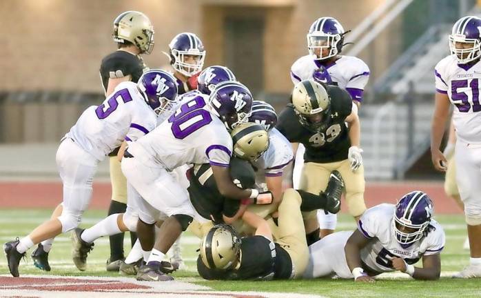 The Crusaders defense swarmed to the ball and shut out the Hawks in the second half.