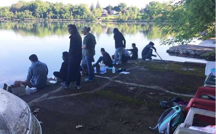 Photo courtesy of Andrew Lawrence Monroe-Woodbury High School students collected samples from Walton Lake in Monroe as part of their water quality analysis. The students will present their findings to the Town of Monroe Conservation Commission on June 21.