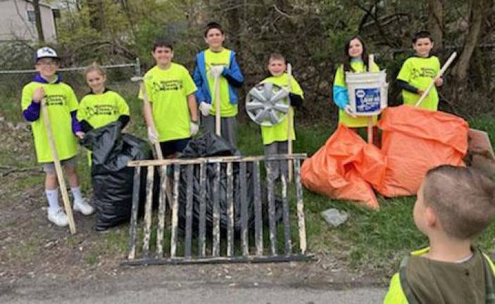Young people made a mighty contribution during Monroe Clean Sweep 2023.