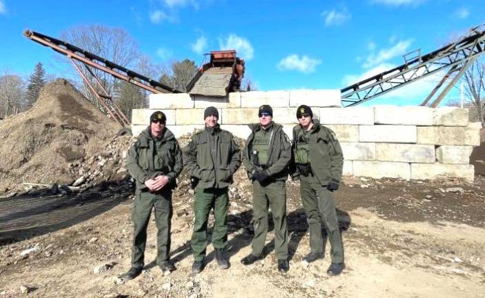 Lieutenant Michael Bello and ECOs Glen Parker, Steven Radomski, and Obadiah Steffen conduct a site visit at an alleged unlawful fill facility in Orange County.
