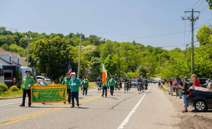 Ancient Order of Hibernians march during the 2023 Monroe Memorial Day Parade.