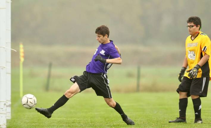 Jesse Schwartz (#13) scores the Crusaders' second goal of the game.
