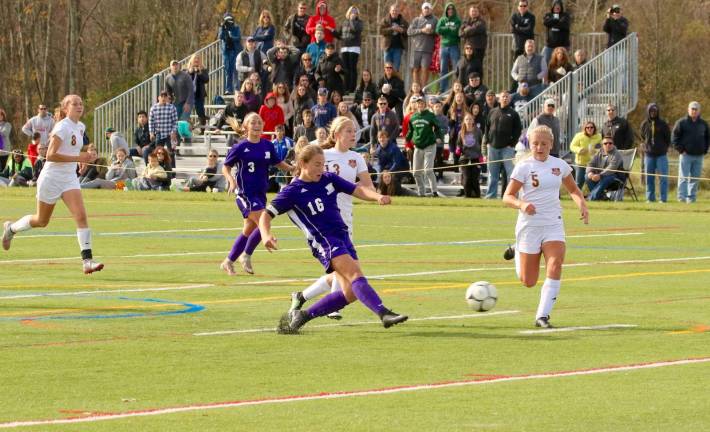 Photos by William Dimmit Liz Myers (#16) put the Crusaders up 1-0 on this shot in the second half.