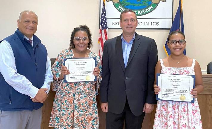 Monroe Town Supervisor Tony Cardone, Madison Lendor, County Executive Steve Neuhaus, and Hailee Lendor.