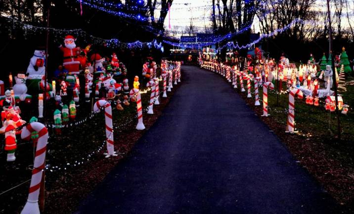 Visiting Spanktown Road to enjoy his spectacular display has become a Christmastime tradition in the Town of Warwick. The lights are turned on at 4 p.m.