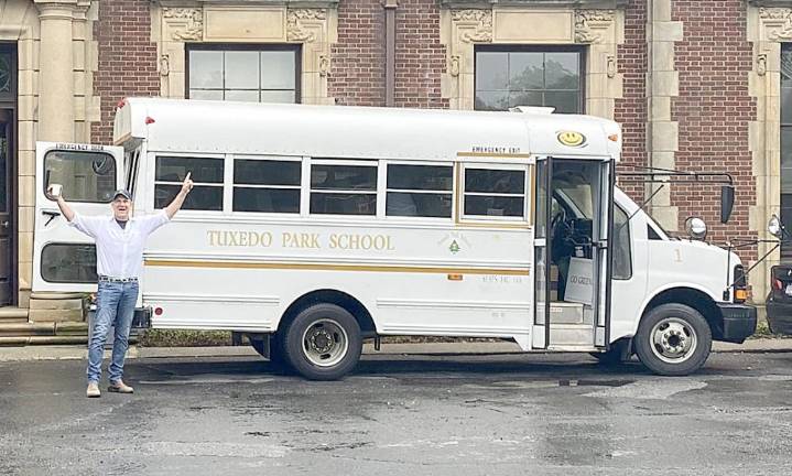 Tuxedo Park administrators board the ‘Happy Bus’