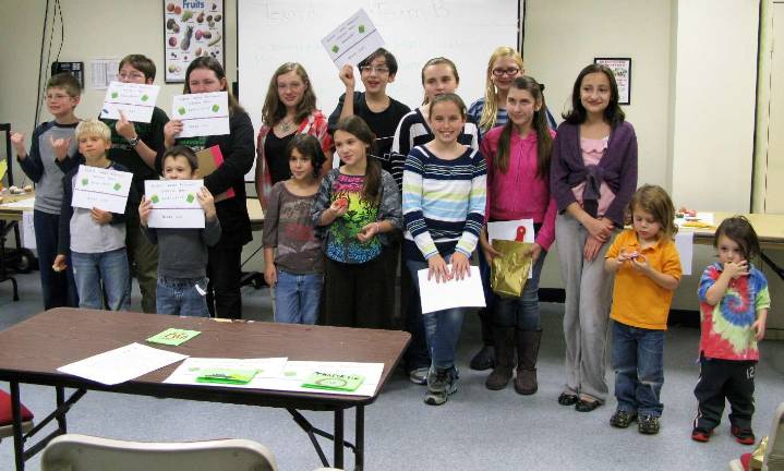 Members of the Hudson Valley Explorers, the 4-H group pictured here, recently competed in a gluten-free cupcake bake-off.