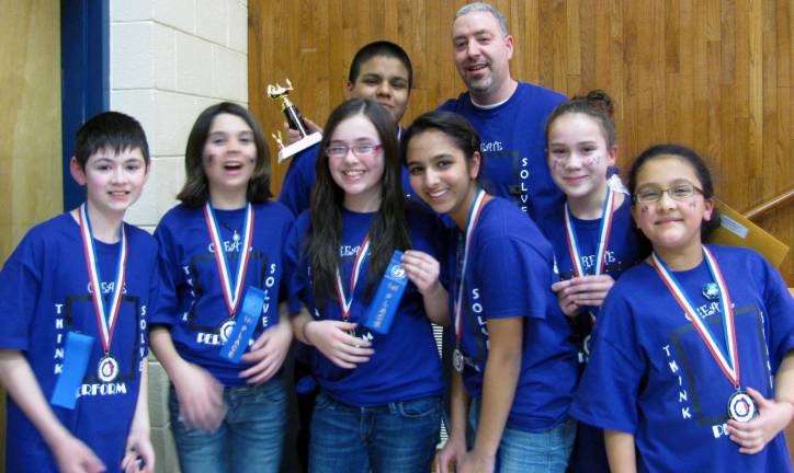 Celebrating their Division II, Problem 5 win are: Michael Donovan, left, Caroline DeLoren, Laura McQuade, Daniel Willis, Akshani Patel, Coach John Cappiello, Iliana Arocho and Ishita Krishan.