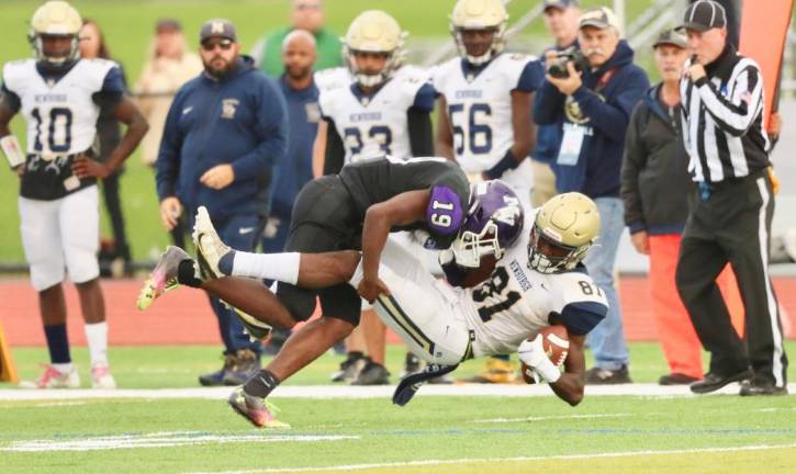 Crusader defender Jayden Coulanges (#19) tackles Goldback receiver Deondre Johnson for a short gain.