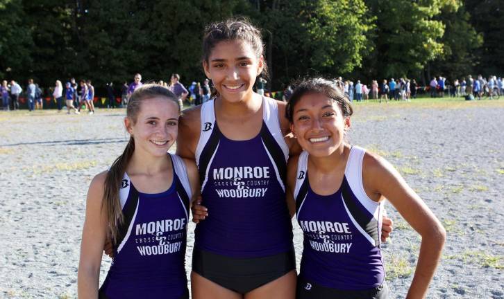 Crusaders (L-R) Cameryn Cain, Leah Smith and Evelyn Gonzalez-Valle led the Crusaders to victory on Tuesday.