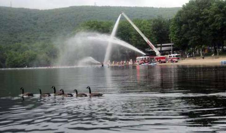 A family of ducks try to crash the party at Kid's Day at the Rez.
