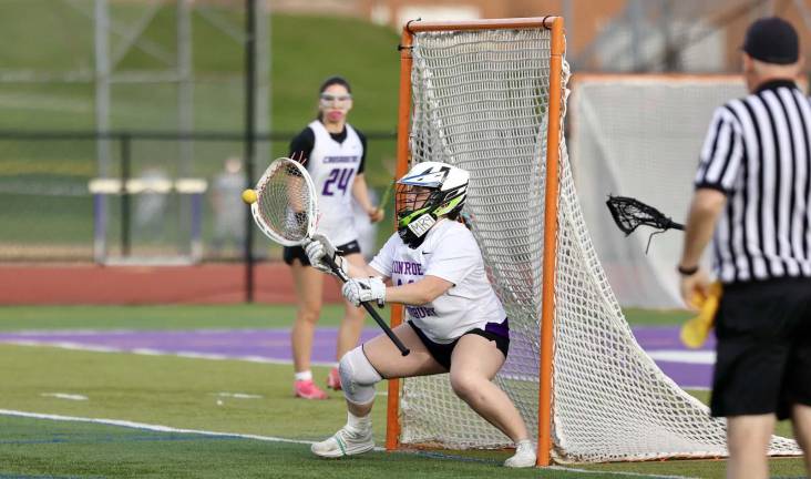 Crusader Goalie Lilly Crowley makes a save on a Wizard shot.