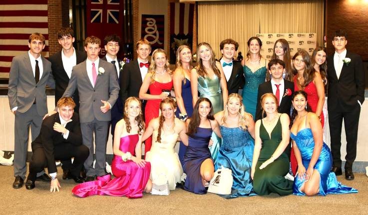 Monroe-Woodbury High School seniors and their dates pose for a last photo before leaving the prom.