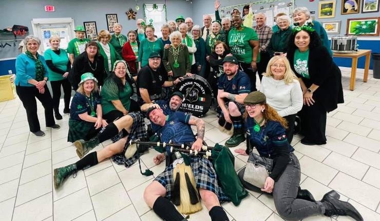 Woodbury Seniors along with members of the Orange County Shields Police Pipes and Drums at the senior center on St. Patrick’s Day. Photos provided by Woodbury Supervisor Kate Luciani .