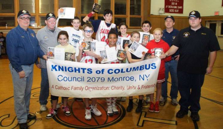 Pictured from left to right are: Greg Soboleski, Jimmy Smyth, Emily Smyth, James O'Boyle, Brendan Bernsley, Evan Jansen, Alyssa Barone, Laura Farjardo, Patrick O'Boyle, Joe Kyle, Mary Costa, Jim Banville and Pat Edwards.