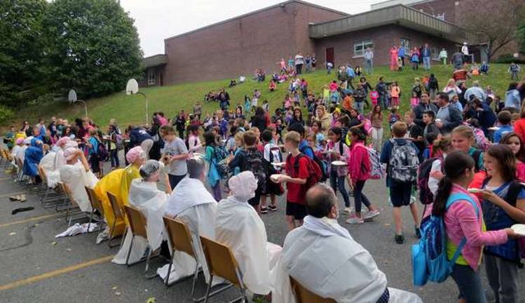 The North Main Elementary School Pie in the Face' event featured 220 participating students and was the most recent group supporting pediatric cancer awareness efforts.