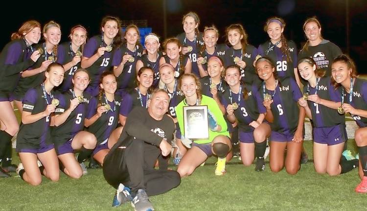 The 2021 Section 9 AA Champion Crusaders celebrate their victory on Saturday Night in Middletown.