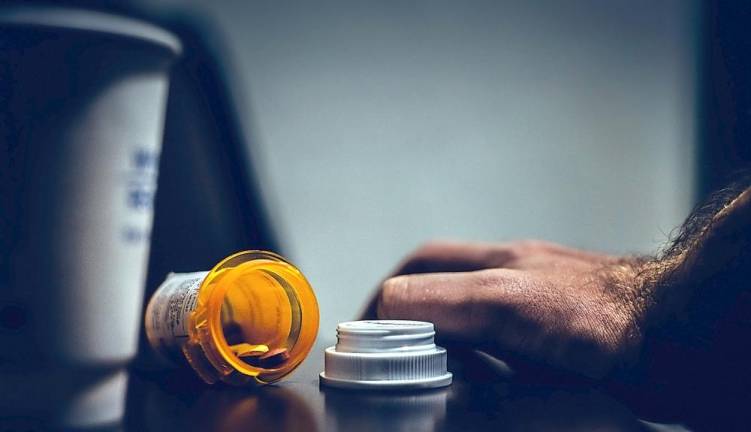 Orange County will receive at least $4.4 million and as much as $7.6 million in proceeds from lawsuits filed against drug manufacturers and distributors responsible for the ravages of opioid addiction, New York Attorney General Letitia James announced on Oct. 5. Photo illustration by Kevin Bidwell from Pexels.